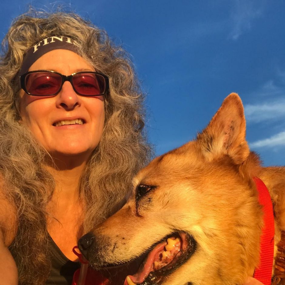 Animal naturopath Dr Kim Bloomer and her dog Schatzie