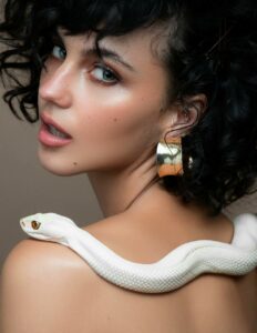 batanes pit viper on woman back